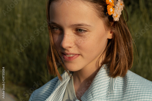 Portrait of a beautiful and stylish girl outdoor