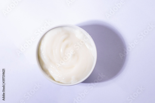 Mayonnaise swirl in white bowl. 