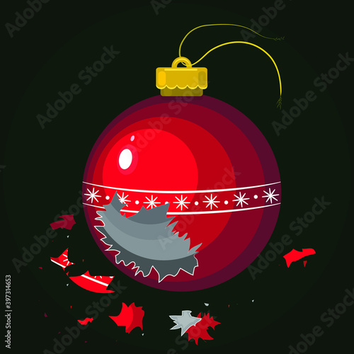 broken red christmas toy ball with shards