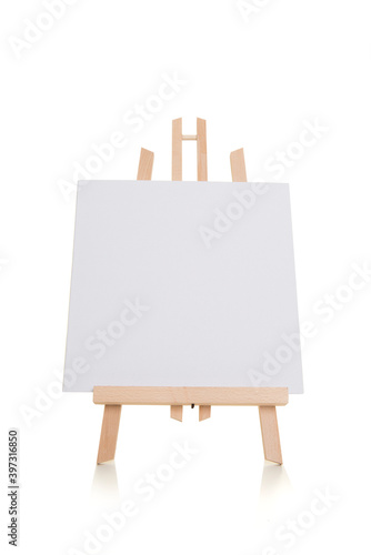 White empty painter easel isolated on a white background