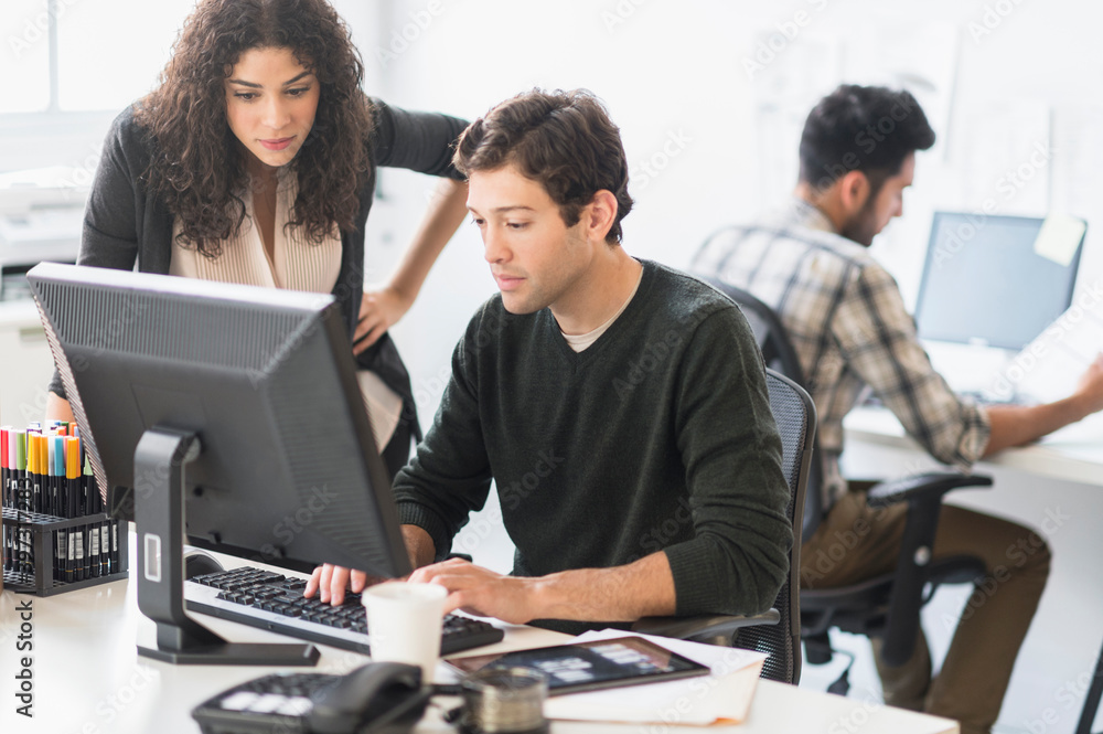 Business people working together in office Business people working together in office