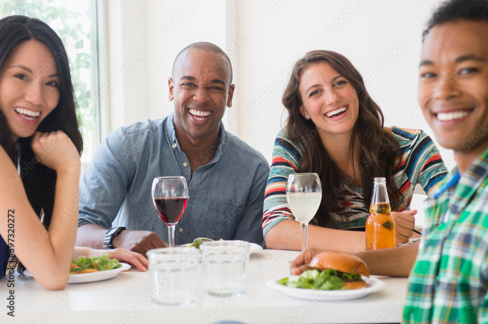 Friends eating together at restaurant Friends eating together at restaurant
