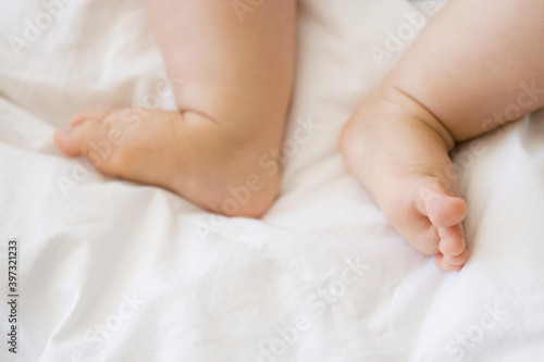 Close up of feet of mixed race baby photo