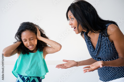 Daughter ignoring yelling mother photo
