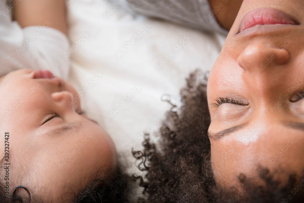 Mother and baby son sleeping on bed Mother and baby son sleeping on bed