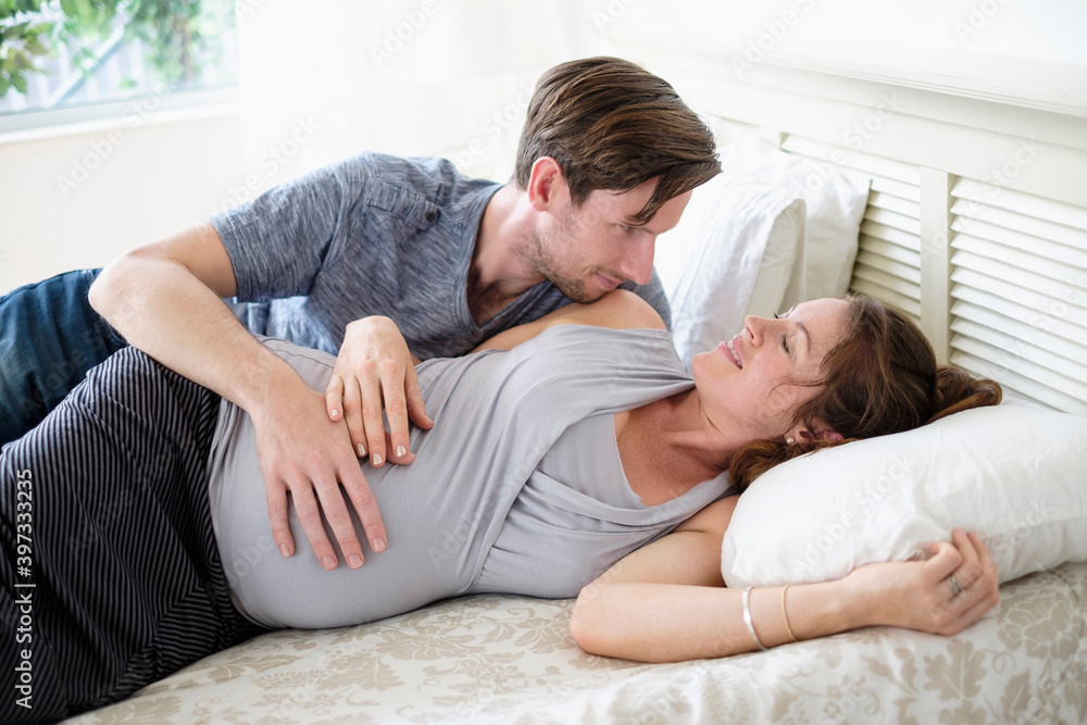 Couple lying in bed Couple lying in bed