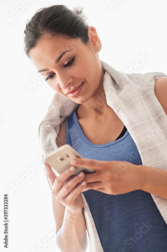 Young woman using smart phone photo