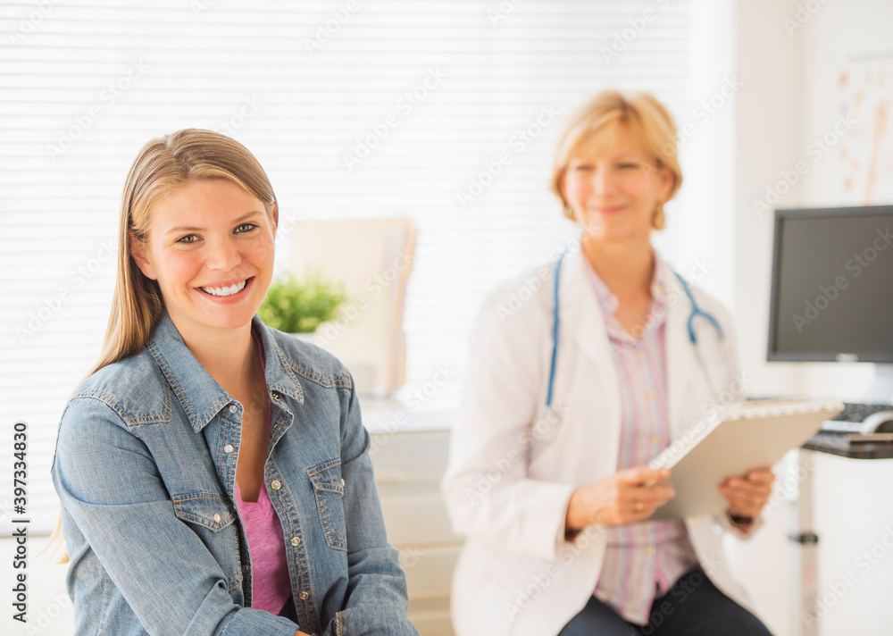 Portrait of young woman visiting doctor Portrait of young woman visiting doctor