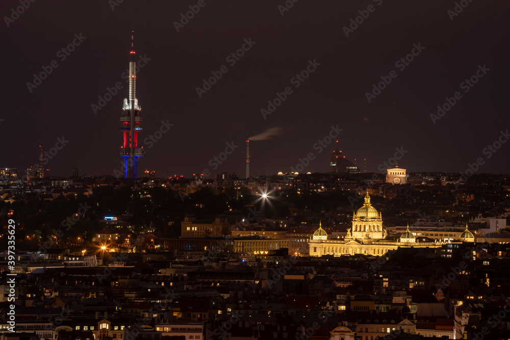 Fototapeta premium .view of the roofs of buildings and street lights in prague at night in the czech republic