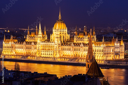 Hungarian Parliament illuminated at night photo