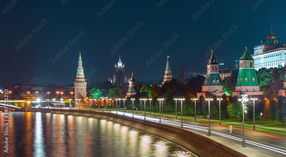 Kremlin embankment in Moscow and old historical buildings.