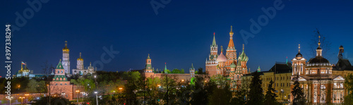 The panorama of center of Moscow city in bright night lights. Moscow Kremlin and Saint Basils Cathedral