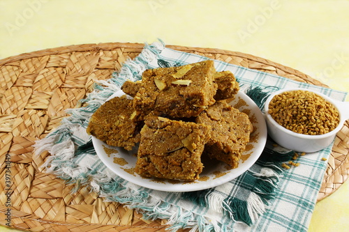 indian gujarati traditional healthy sweet for winter immunity methi pak or methi ladoo made from butter,fenugreek,dry fruit and other spices