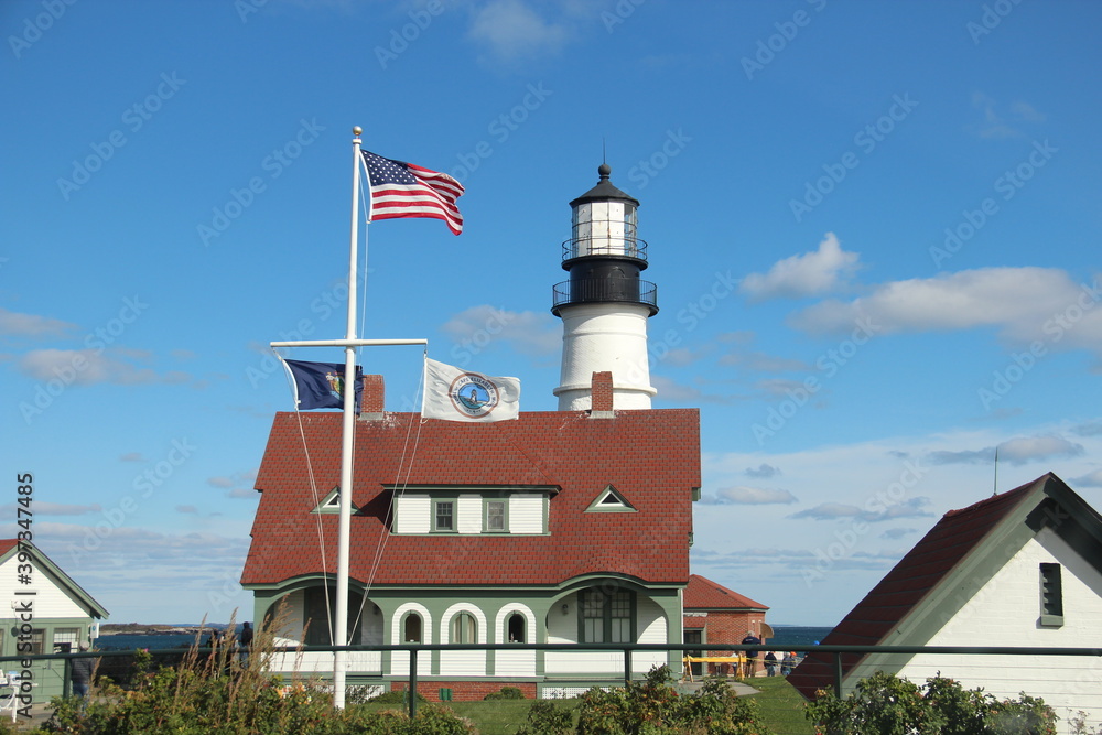 The Lighthouse with the USA's flag  in Kennebunkport Maine. 