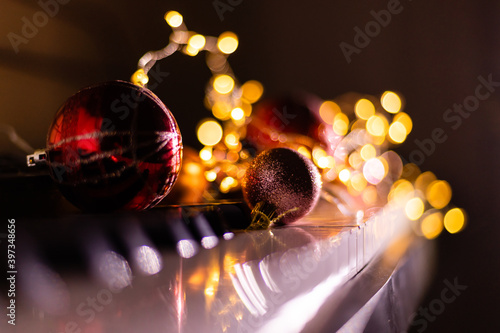 Canvas Print Festive decor on piano keys indoors, closeup. Christmas music