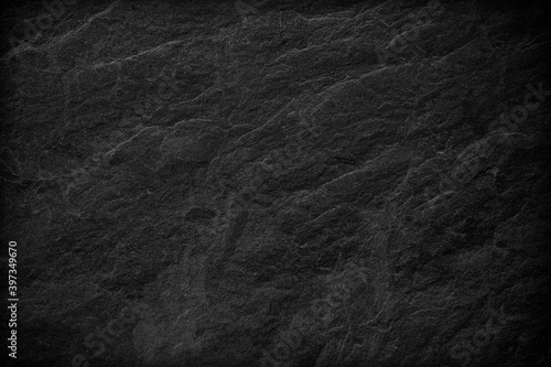 Dark grey black slate background or texture.