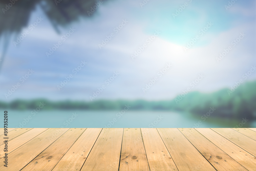 Empty wooden board empty table in front of blurred background. Perspective brown wood over wind lagoon background - can be used mockup for display or montage your products. copy space. Empty wooden board empty table in front of blurred background. Perspective brown wood over wind lagoon background - can be used mockup for display or montage your products. copy space.