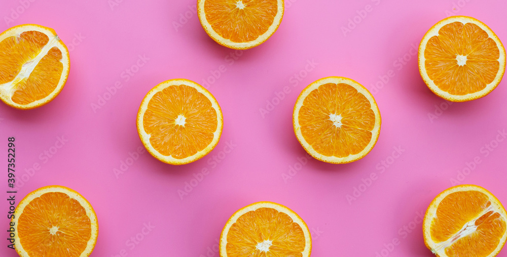 High vitamin C, Juicy and sweet. Fresh orange fruit on pink background. High vitamin C, Juicy and sweet. Fresh orange fruit on pink background.