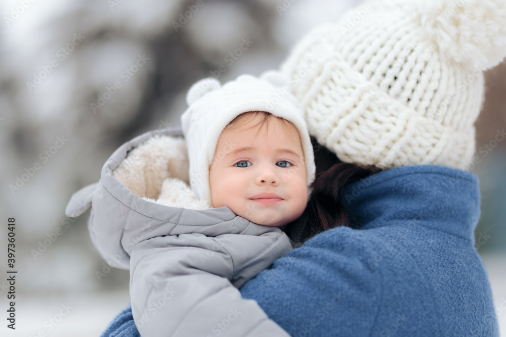 Cute Baby Enjoying First Snow in Winter Time Cute Baby Enjoying First Snow in Winter Time