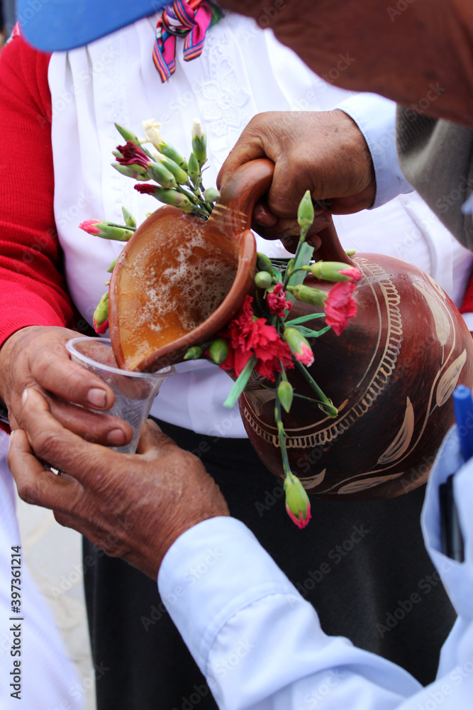 Love with Andean chicha in Quechua indigenous people. Stock Photo
