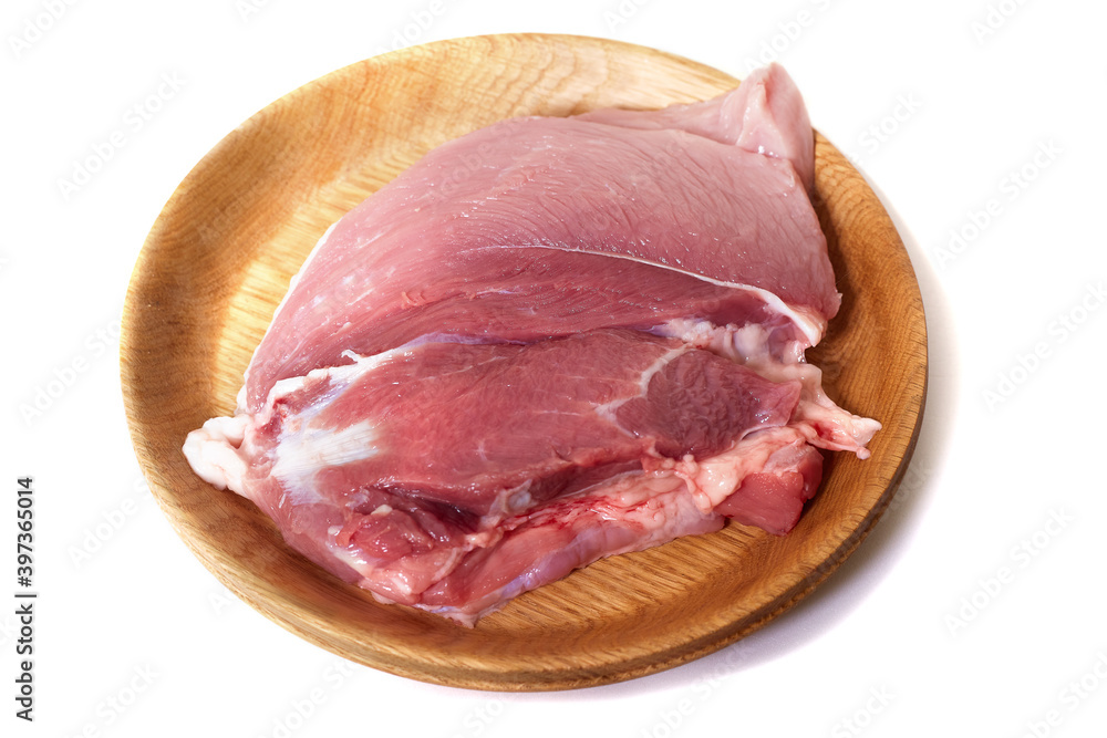 A plate of raw meat of pork on white background