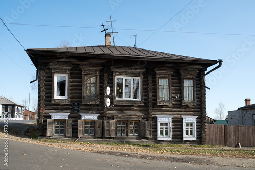 Two-story log house built in the 2 half of the 19th century, the Bolshevik Ada Lebedeva lived in it in 1905-1906, what is written on the table.