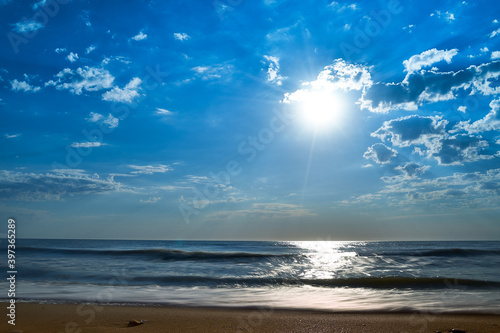 Sea sunset. Quiet calm sea. Sand beach.