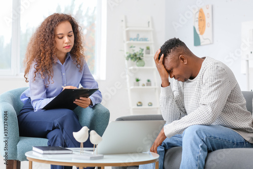 Psychologist working with A...