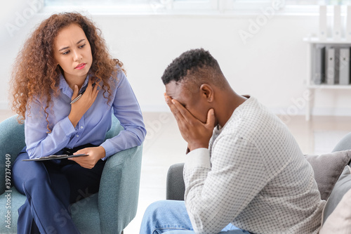 Psychologist working with A...