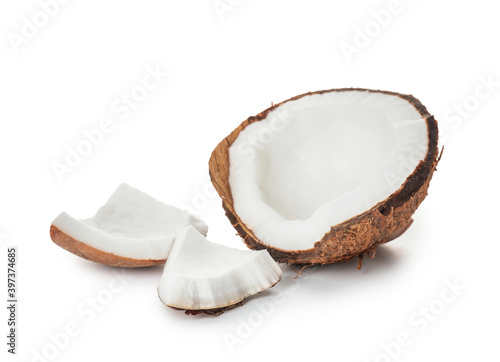 Pieces of ripe coconut on white background