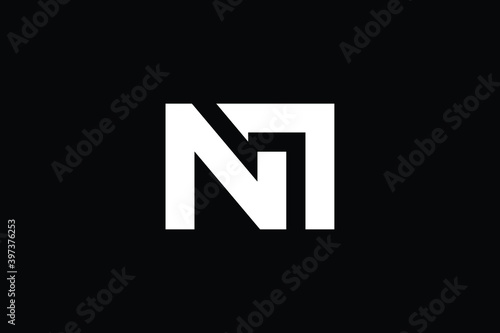 NM logo letter design on luxury background. MN logo monogram initials letter concept. NM icon logo design. MN elegant and Professional letter icon design on black background. M N NM MN