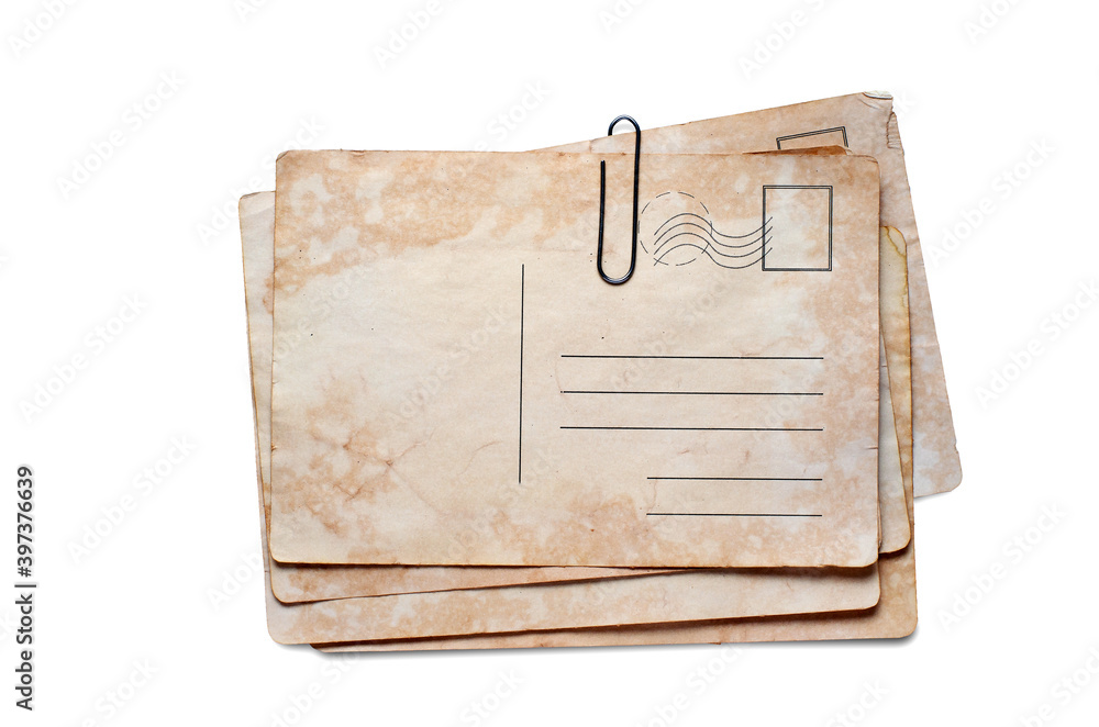 Fototapeta premium Old postcards. Copy space. Isolated on white