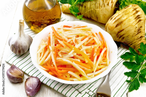 Salad of parsnip and carrot on napkin