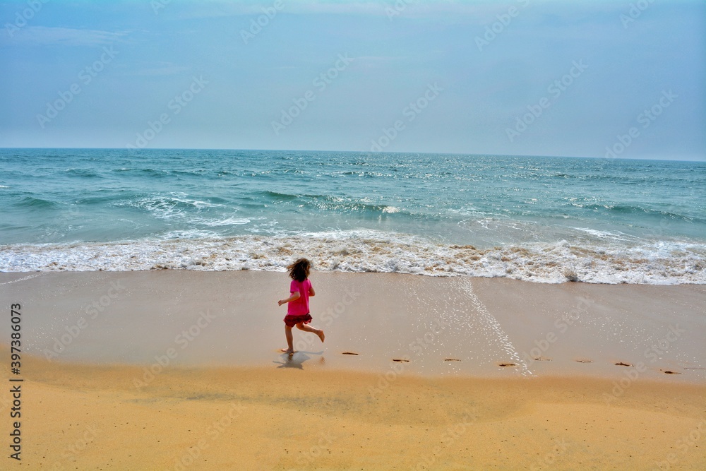 little kid on beach