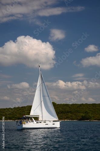 Boat sailing in the Adriatic Sea, Croatia on a sunny day.