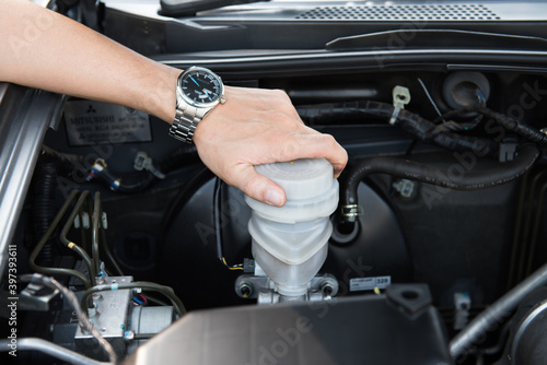 Hand shifting the gear stick,business man,driving car