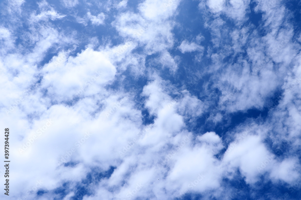 Fototapeta premium Blue sky background with clouds, White clouds floating on blue sky for backgrounds concept