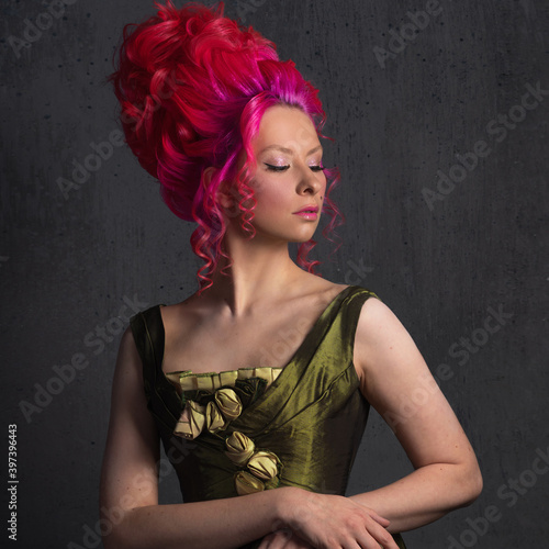 Mix of old and new style, concept. A gorgeous lady in a Baroque style photo