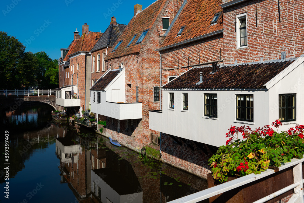 houses along canal in Appingedam, The Netherlands
