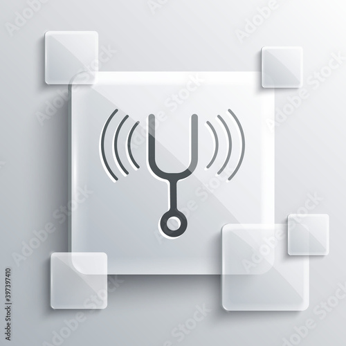 Grey Musical tuning fork for tuning musical instruments icon isolated on grey background. Square glass panels. Vector.