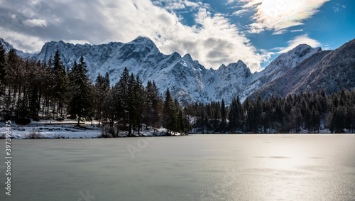Frozen lake of fusine in a sunny afternoon, Friuli-Venezia Giulia, Italy