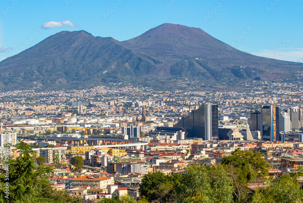 Naples, Italy - a Unesco World Heritage old town, Naples displays also a modern business center, here dominated by Mount Vesuvius on the background 