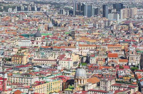 Naples, Italy - a Unesco World Heritage old town, Naples displays also a modern business center, here dominated by Mount Vesuvius on the background  © SirioCarnevalino