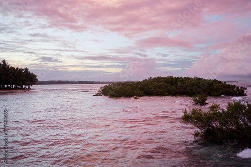 Fototapeta Naklejka Na Ścianę i Meble -  Beautiful landscape with colorful sunset on the tropical seashore.