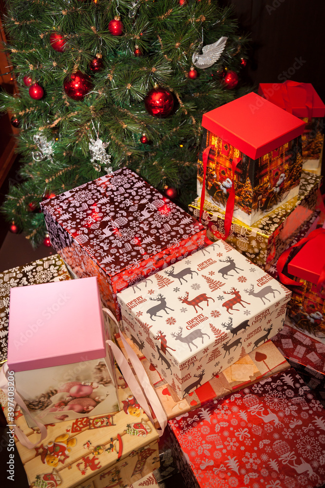 Christmas gifts under the tree. Gift boxes under the Christmas tree.