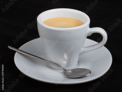 Espresso coffee in a white Cup