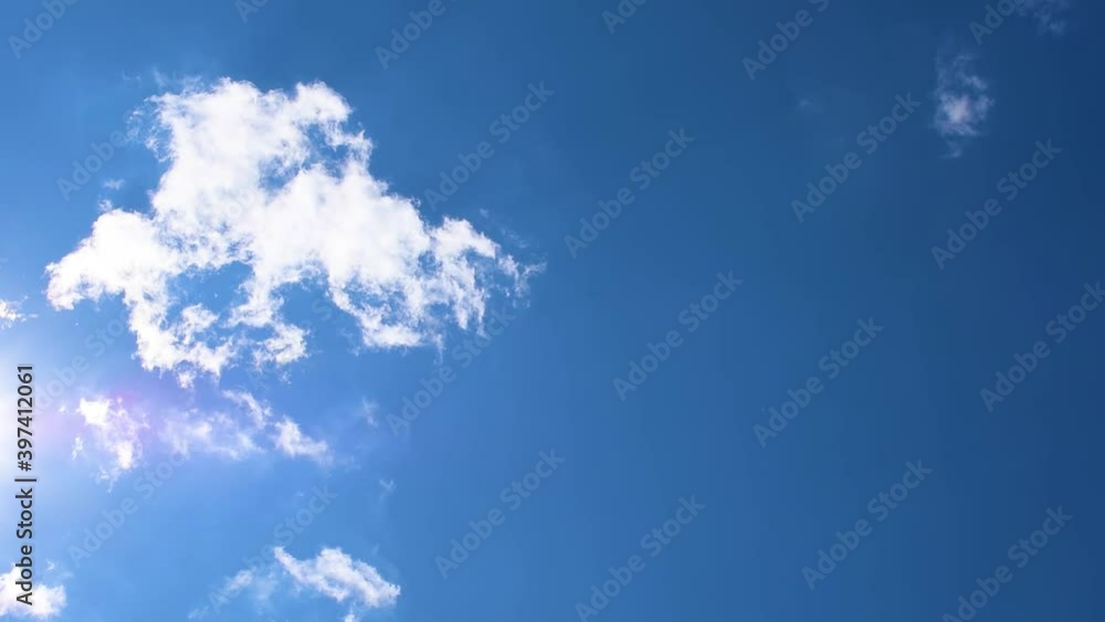 Clouds in the sunshine, fast motion. The passage of time.