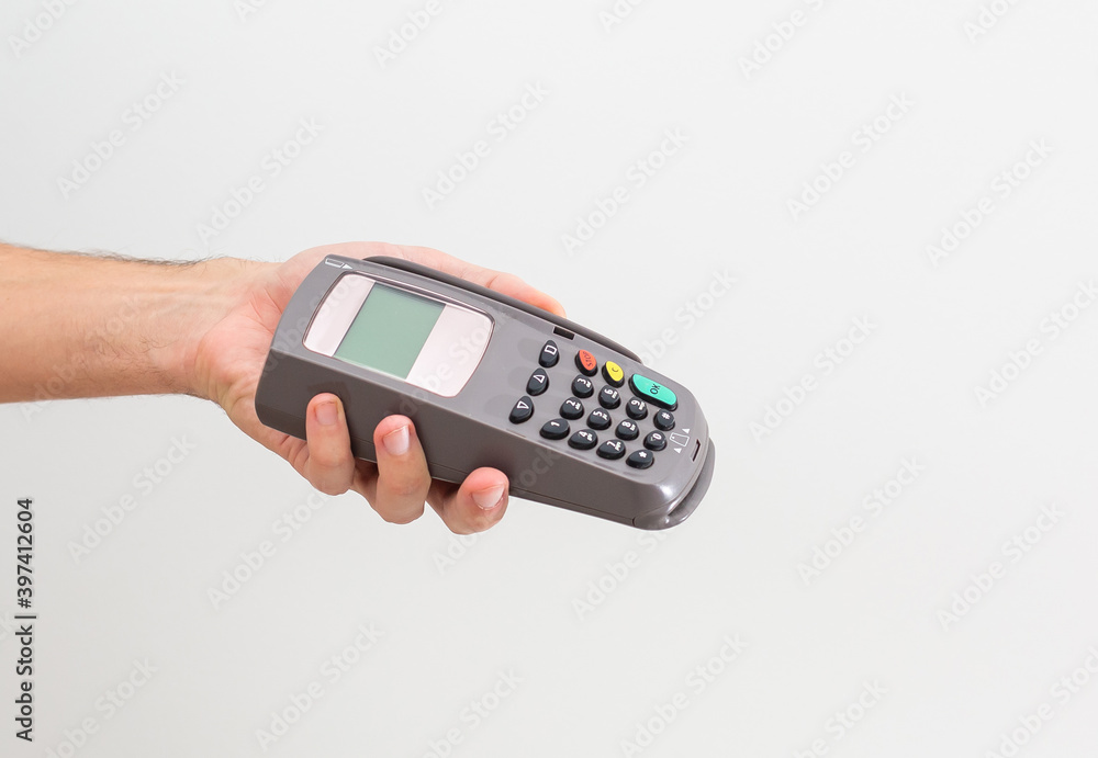 Payment on a trade through contactless card and NFC technology. Front view. Horizontal composition. Payment on a trade through contactless card and NFC technology. Front view. Horizontal composition.