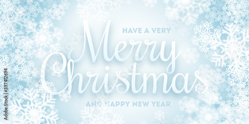 Merry Christmas Greeting Card Vector Illustration With 3D Calligraphic Text And White Soft Snowflakes On Light Blue Background. Xmas And Happy New Year Greetings Vector Wallpaper