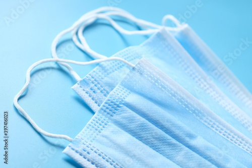 Close up of blue surgical masks on table 